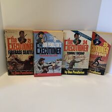 Four Don Pendletons Softcovers The Executioner #21,25,34, And 35.  picture