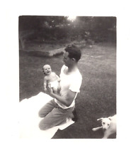 Vintage 1931 Photograph Named Man with baby in yard picture