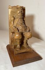 antique hand carved seated figural seated man wood sculpture statue folk art . picture