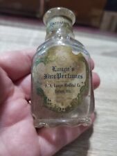 Antique Lange's fine perfumes bottle. F.A Lange medical Co. DePere WI. Carnation picture