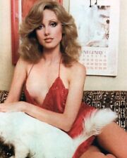 Morgan Fairchild 1970's in sheer low cut negligee seated on sofa 8x10 photo picture