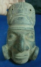 Peruvian mask of Inca warrior  - carved in stone picture