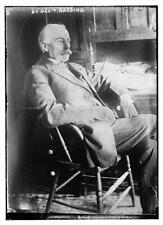 Photo:Geo. T. Harding reclining in chair picture