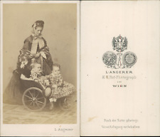 Angerer, Wien, young woman and her two grandchildren in pram stroller, circa picture