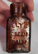 Antique Ely's Cream Balm Amber Glass Medicine Bottle (#41) picture