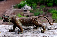 A very fine small antique bronze tiger figurine. Impressed detail.Chinese picture