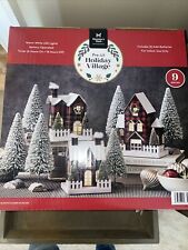 Member's Mark 9-Piece Pre-Lit Holiday Village - Red Plaid picture