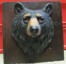Beautiful Sculpted Black Bear Head Décor on a Wooden Panel picture