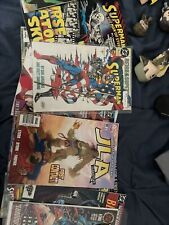 Lot of superman comics (26) Includes 3 Super girl comics and JLA comics. picture