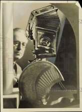 1938 Press Photo N.B. Aukerman fixing a camera - nei61681 picture