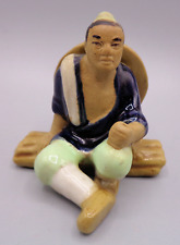 Chinese Pottery Man Conical Hat Sitting on Wood Pile Figurine Vintage picture