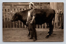 c1910 RPPC Portrait of Handsome Man Cattle Farmer with Bull Cow Postcard picture