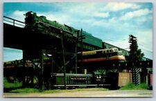 eStampsNet - Two Over One Railroad Fare Trains Postcard  picture