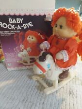 RARE VALUABLE  Baby Rock A Bye Battery operated doll on a rocking horse picture