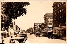 Real Photo Postcard Looking North on Main Street in El Dorado, Kansas picture