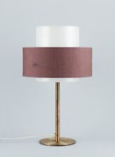 Luxus, Sweden. Large table lamp in brass with a shade in plastic and fabric. picture