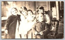 RPPC Happy Smiling Children c1904-1918 AZO Porch or Home Real Photo Postcard picture