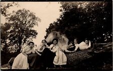Postcard Eight Young Ladies Posing on Tree, Two Blurred RPPC Real Photo Cl picture