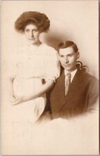 Minneapolis, MN RPPC Photo Postcard Sad-Looking Young Couple / Studio Portrait picture
