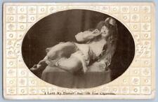 1910 WOMAN SMOKING 