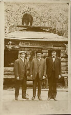 RPPC Postcard Men Posing In Front Of Log Home W Bear On Top Portrait God Bless picture