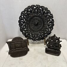 Antique Cast Iron Lot Reticulated Plate Ornate & 2 Door Stoppers Sailboat & Lady picture