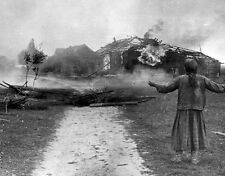 Russian Woman watches her home burn 8