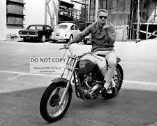 STEVE McQUEEN ON MOTORCYCLE MAKING FEELINGS KNOWN - 8X10 PUBLICITY PHOTO (AB890) picture