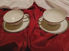 Two elegant tea pairs. Two Cups and Two Saucers  picture