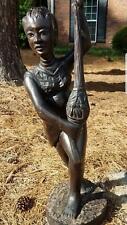 Woman Playing the Shekere Sculpture picture