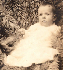 Postcard RPPC Real Photo Infant Baby In White Dress Laying On Fur Rug Vintage picture