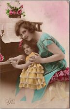 Vintage Tinted Photo RPPC Greetings Postcard Mother & Girl at PIANO -UK Cancel picture