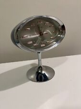 SPACE AGE RHYTHM CLOCK MADE IN JAPAN 1970s. OVAL SILVER MODEL 2 JEWELS picture