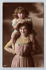 c1915 RPPC Hand Colored Studio Portrait Mother Daughter Piggy-Back Ride Postcard picture