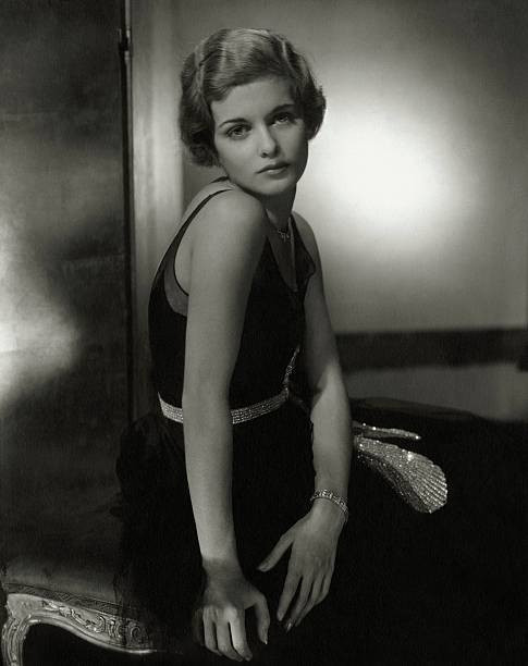 Actress Joan Bennett wearing a sleeveless black dress with a lam 1930s Old Photo
