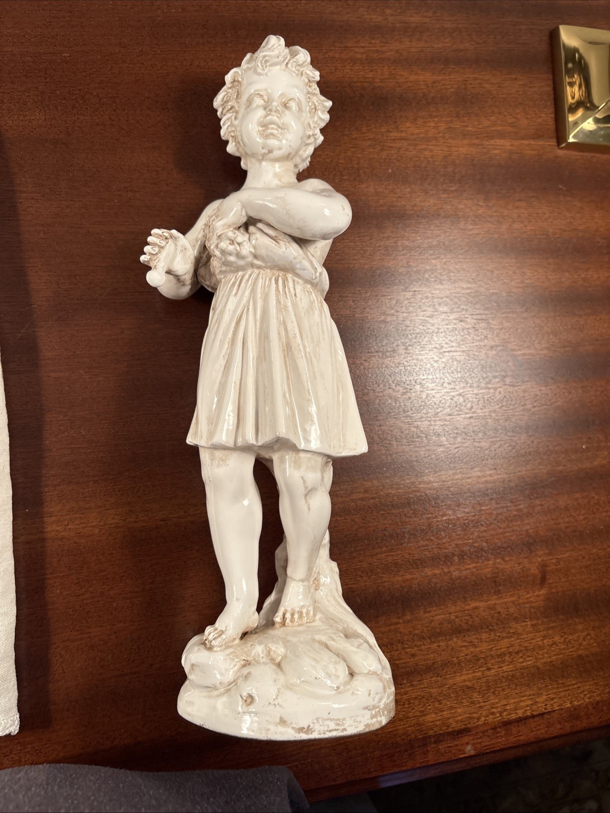 vintage/antique ceramic figurine cherub on rocky base - mid 20th century Italian