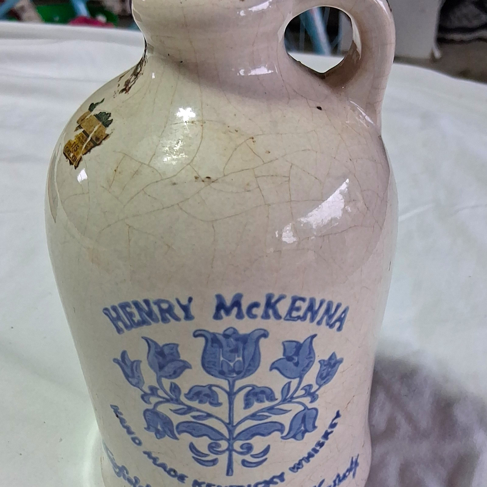Vintage McKenna Distillery Advertising Jug Crock, Beige & Blue