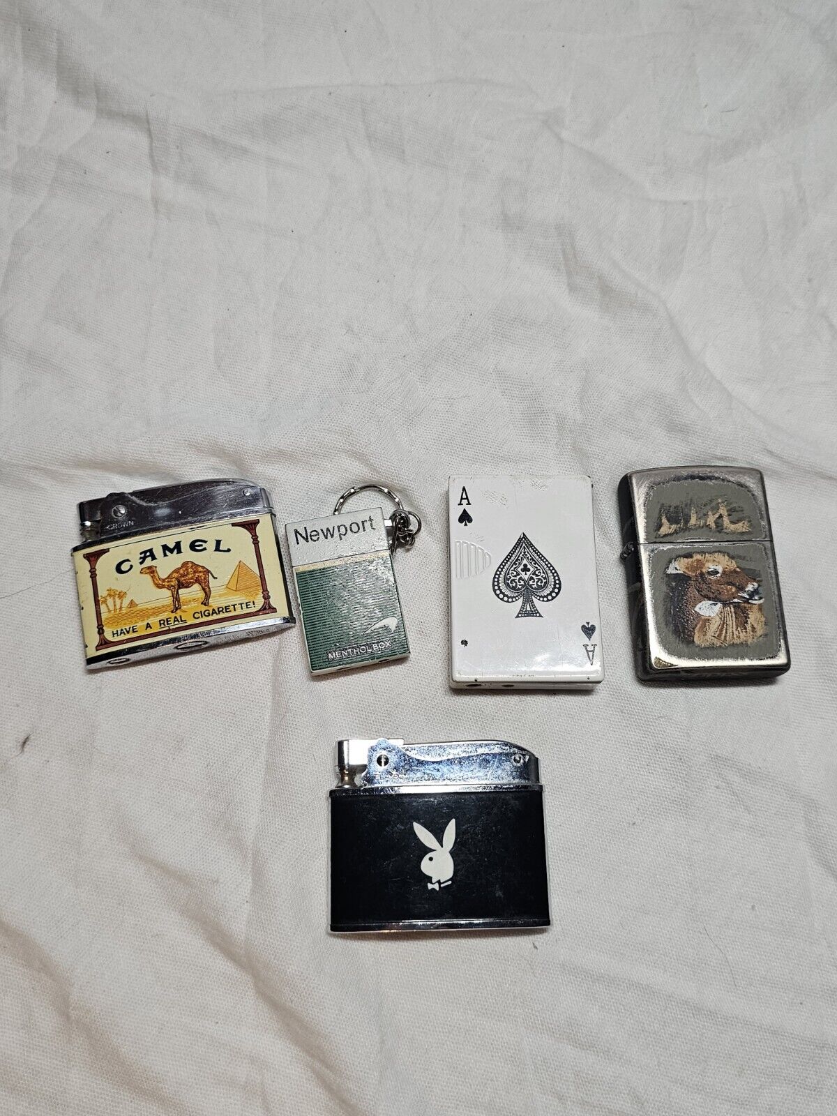 Lot of five zippo and other brand lighters