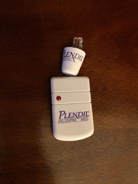 Drug Rep Vintage Plendil Magnetic Clip & Rotating Cord Detangler 