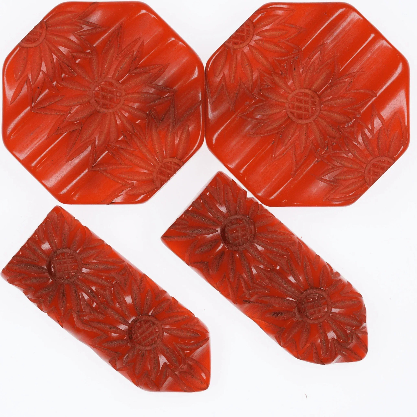 c1940\'s Deep carved Orange bakelite buckle and dress clip set