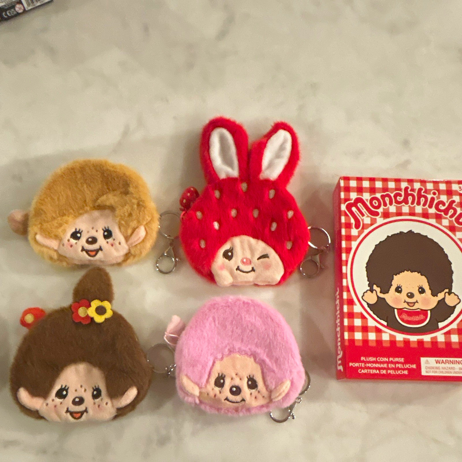 Monchhichi Plush Coin Purse Keychain Full Set of 4 - box open to reveal surprise