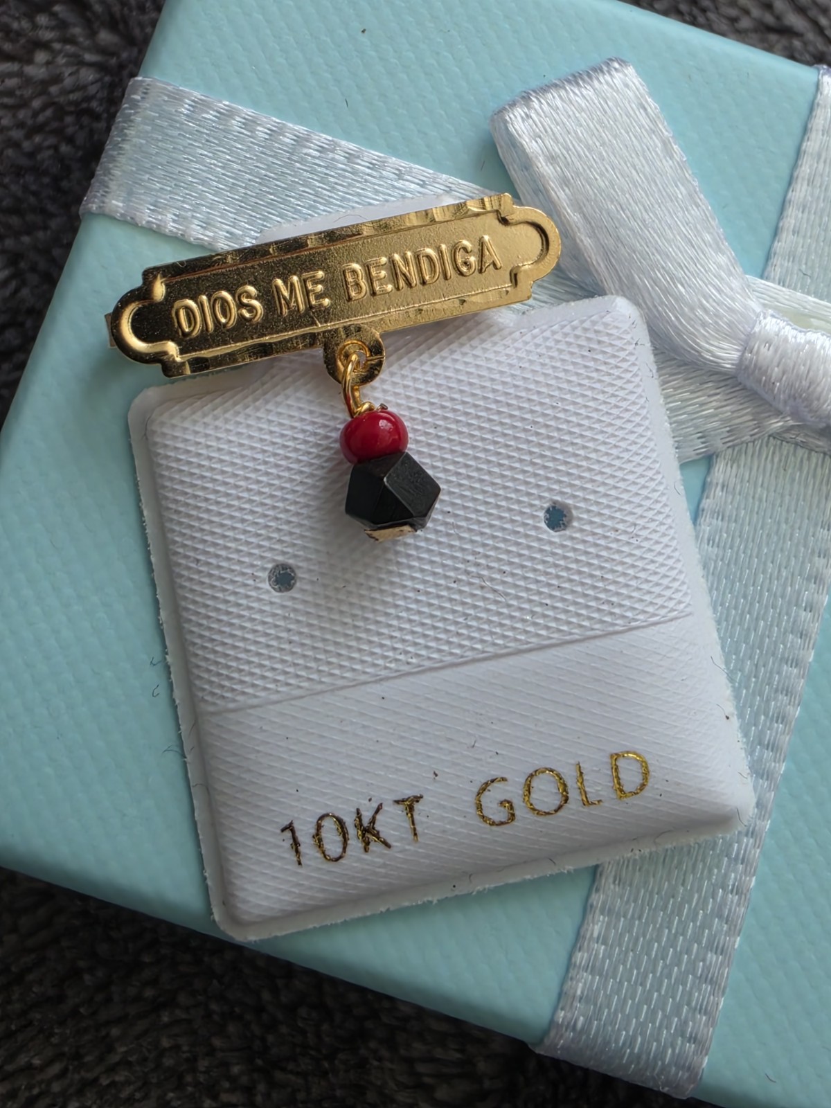 10Kt Yellow Gold Dios Me Bendiga with Genuine Azabache Baby Pin 10Kt Yellow Gold Dios Me Bendiga with Genuine Azabache Baby Pin