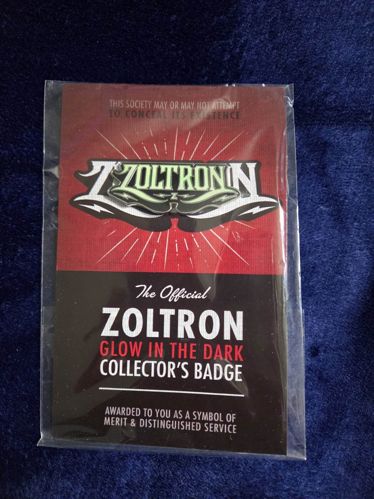 Zoltron  Official Glow In The Dark Collectors Badge Limited Edition /200