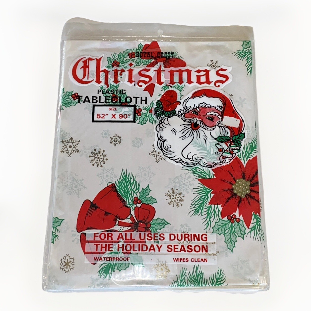 Vtg Royal Crest NEW Christmas Tablecloth Santa Floral Bells 52” X 70” Wipe Clean