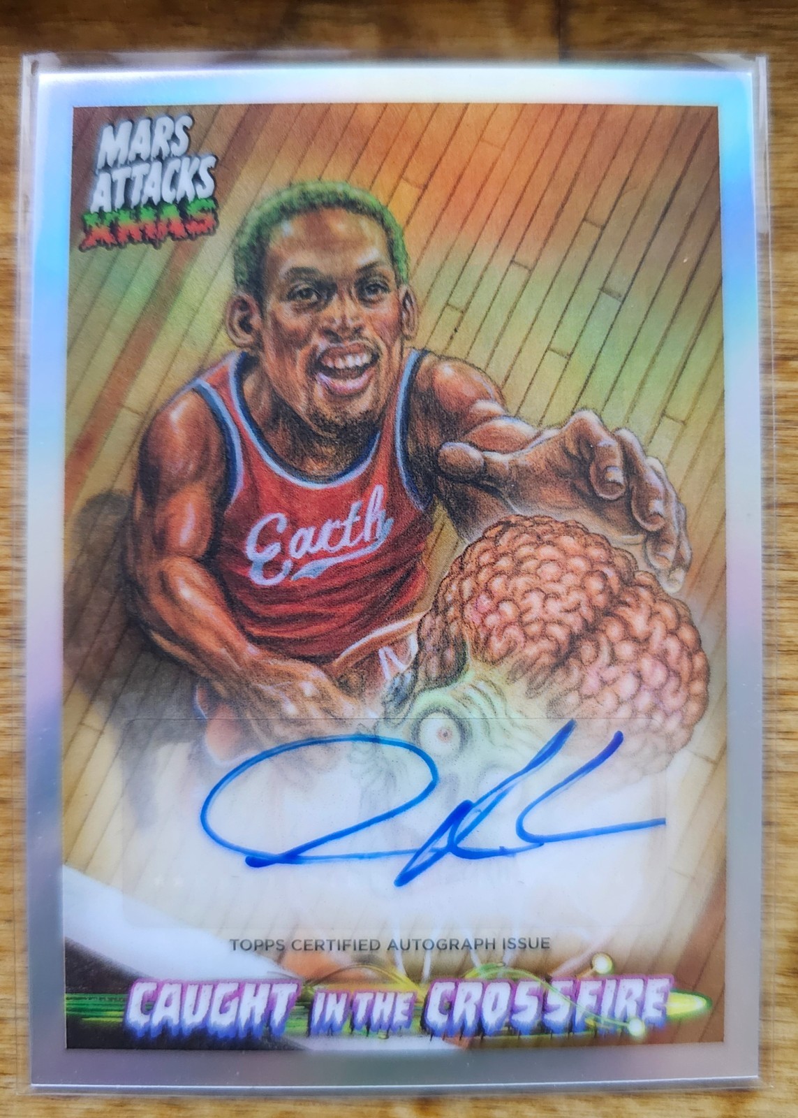Topps 2026 Mars Attacks Christmas DENNIS RODMAN AUTO CAUGHT IN THE CROSSFIRE
