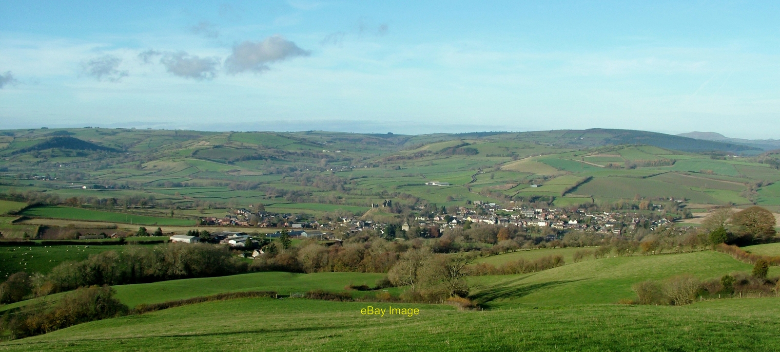 Photo 6x4 View North over Clun village The beautiful view from Upper Ridd c2014