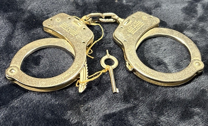 Vintage Smith & Wesson Handcuffs - Springfield Massachusetts - With Key Vintage Smith & Wesson Handcuffs - Springfield Massachusetts - With Key