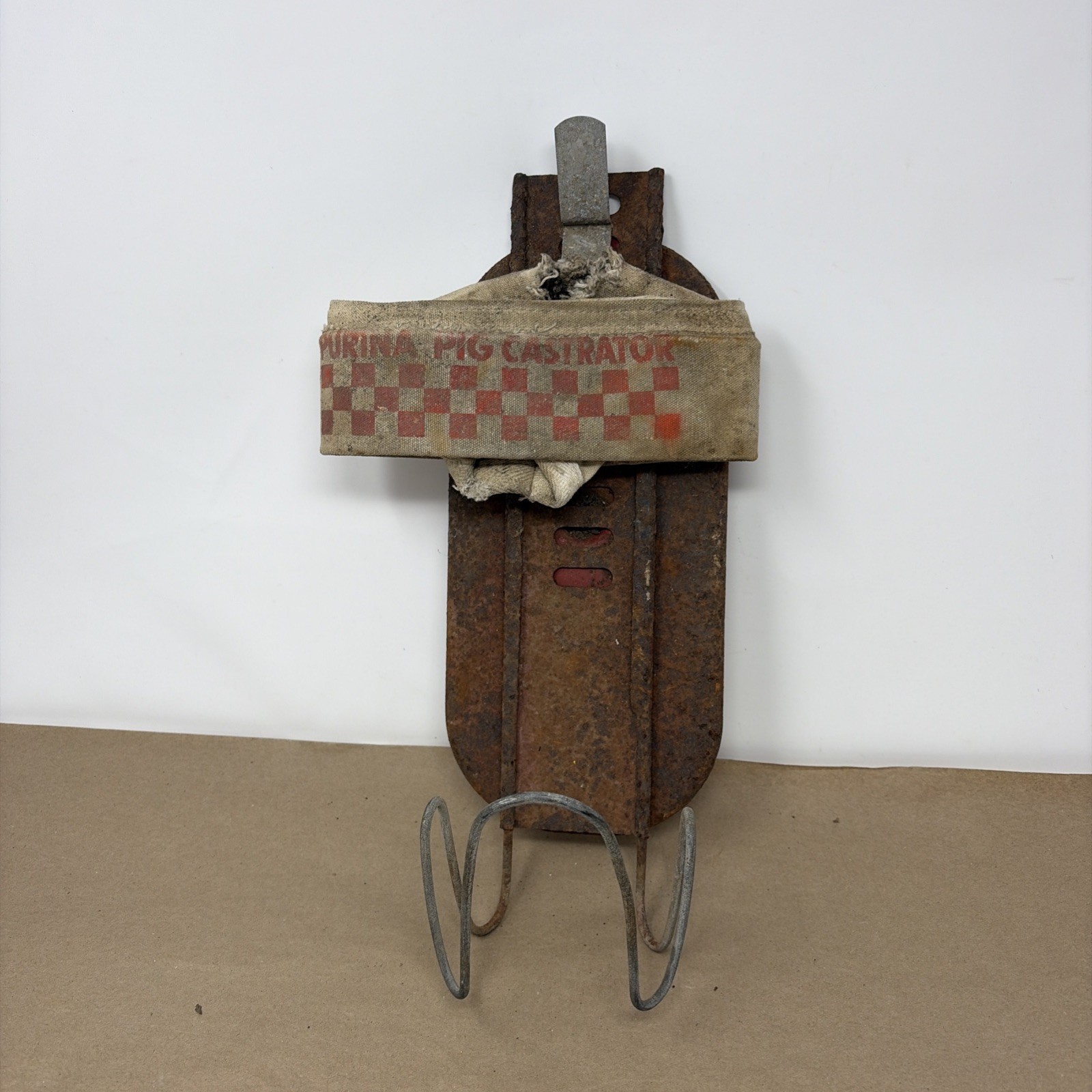 Purina feeds pig castrator vintage