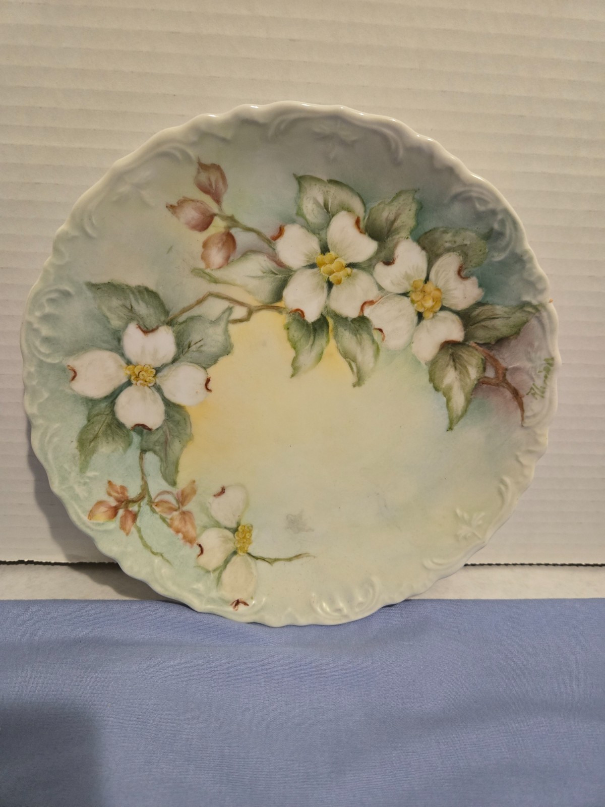 A Porcelain Hand Painted  Dogwood Blossom flower artist signed raised edge