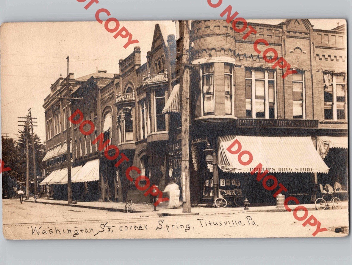 c1910 Washington Street & Spring St TITUSVILLE Pennsylvania PA Drug Store RPPC